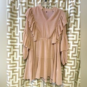 Tan and white polka dot lightweight dress.